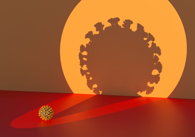 digital illustration of coronavirus and shadow