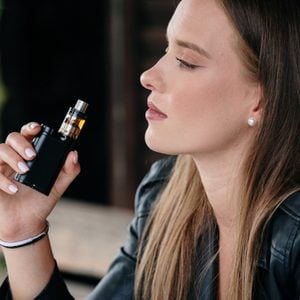 Closeup of woman smoking electronic cigarette