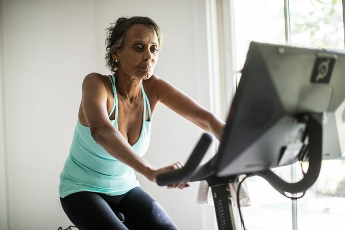 mature woman on exercise bike