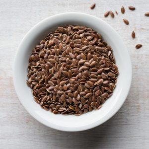 Close-Up Of Flax Seeds On Table