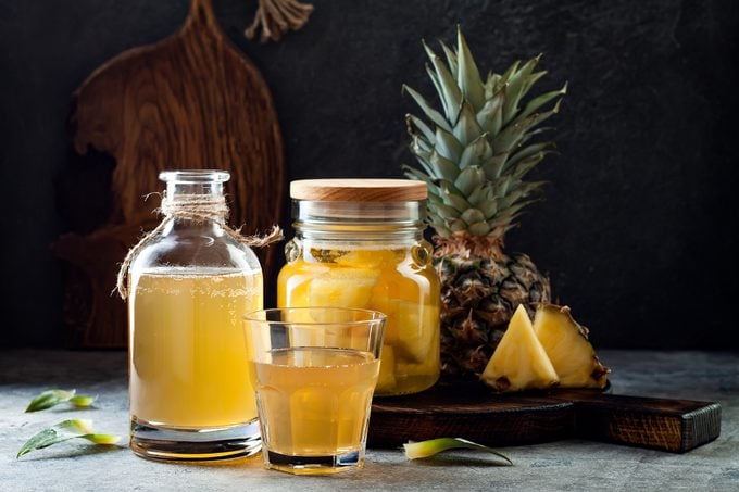 Fermented mexican pineapple Tepache. Homemade raw kombucha tea with pineapple. Healthy natural probiotic flavored drink.