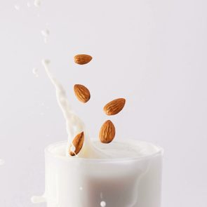 almonds splashing in milk