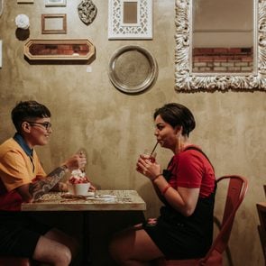 Two women on a date in cafe