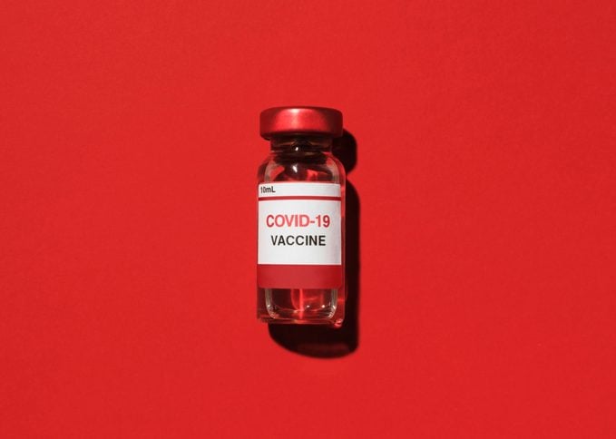 covid19 vaccine on red background