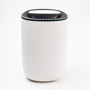 Close-Up Of Air Purifier Against White Background