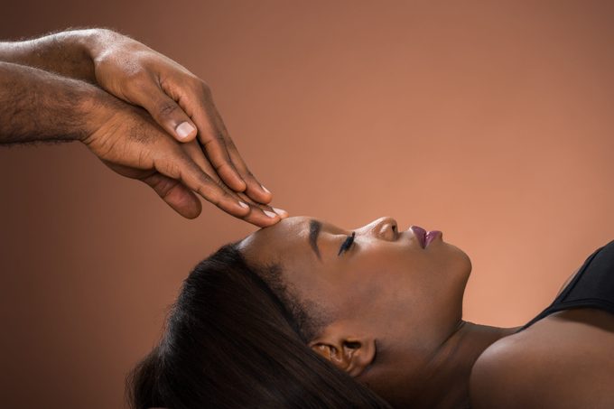 Woman Receiving Forehead Massage