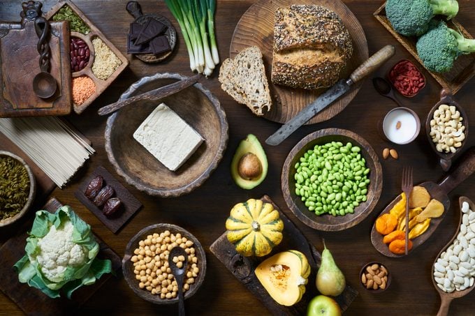 Vegan foods including vegetables and breads