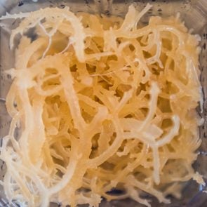 Macro closeup of fresh clear irish moss seaweed in blender
