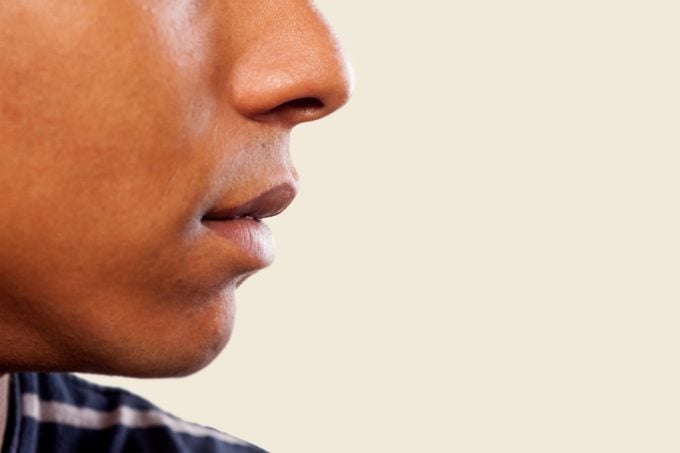 close up of man's nose and mouth