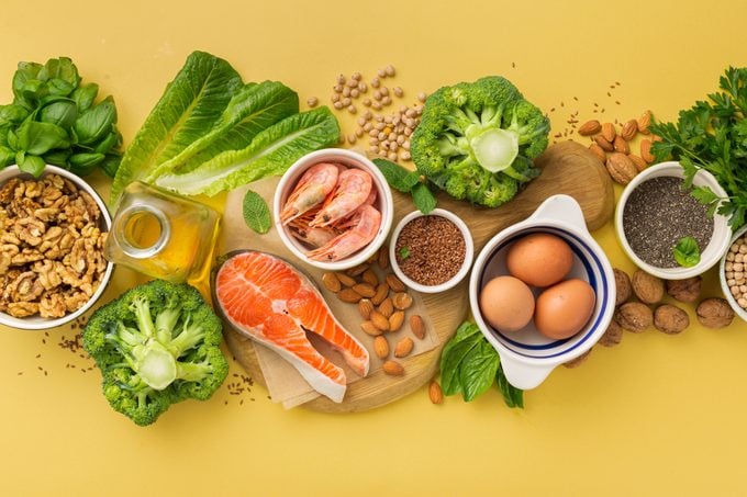omega 3 and omega 6 food sources on yellow background