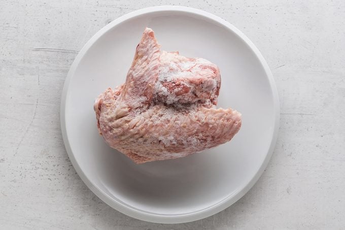 overhead view of frozen turkey on plate