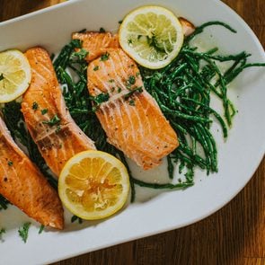 Salmon on a serving plate on a table