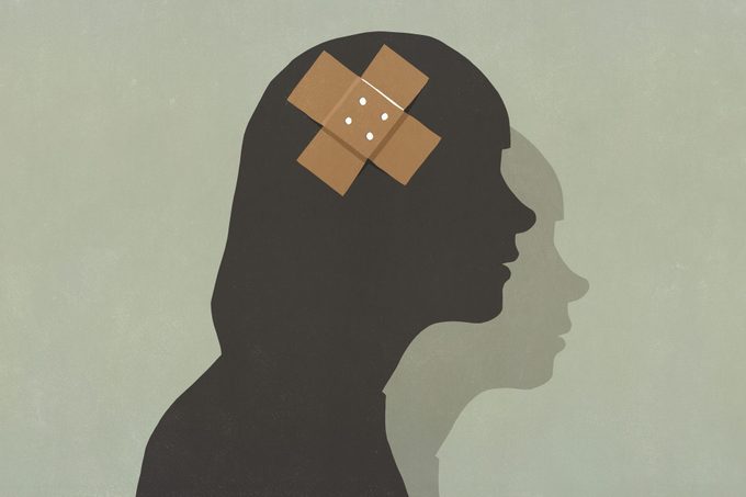 illustration of a Silhouette of a woman with bandaids on brain