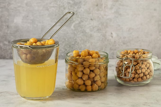 aquafaba and chickpeas in jars