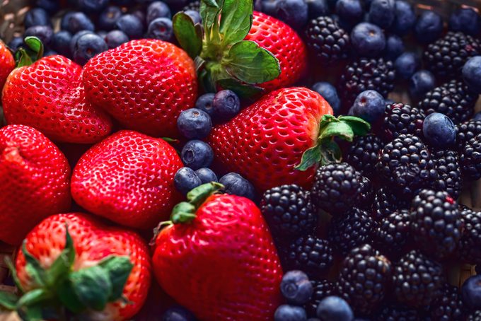 strawberries, blueberries, and blackberries close up
