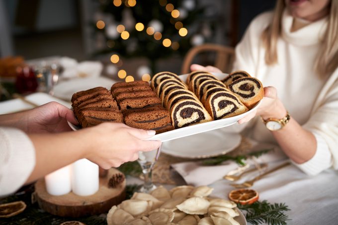 passing out traditional desserts on christmas