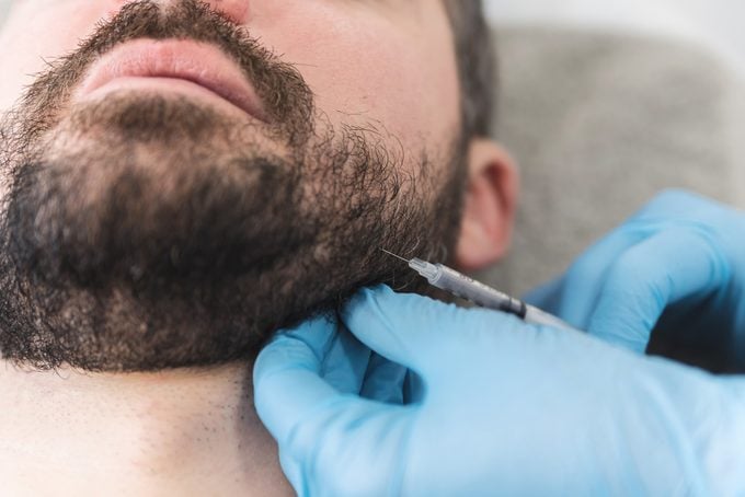 Man getting botox in jaw line for TMJ treatment