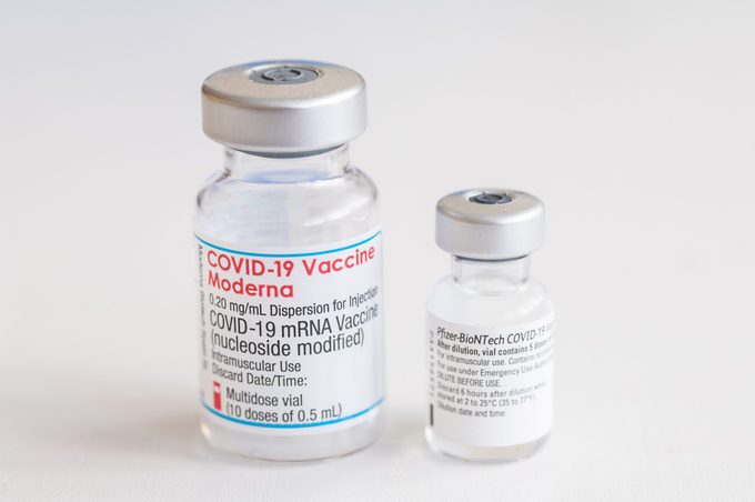 moderna and pfizer covid vaccine vials side by side