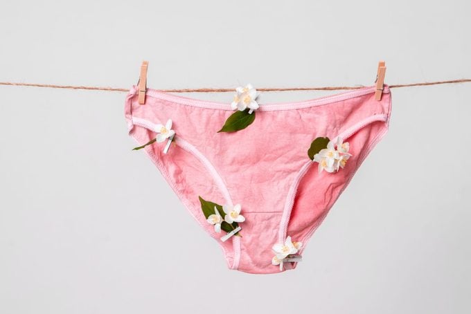Woman's pink underwear with flowers on clothesline