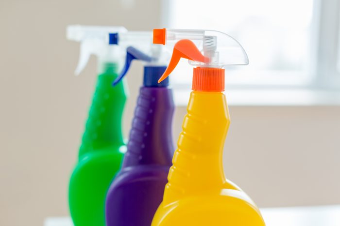 disinfectant spray bottles in bathroom