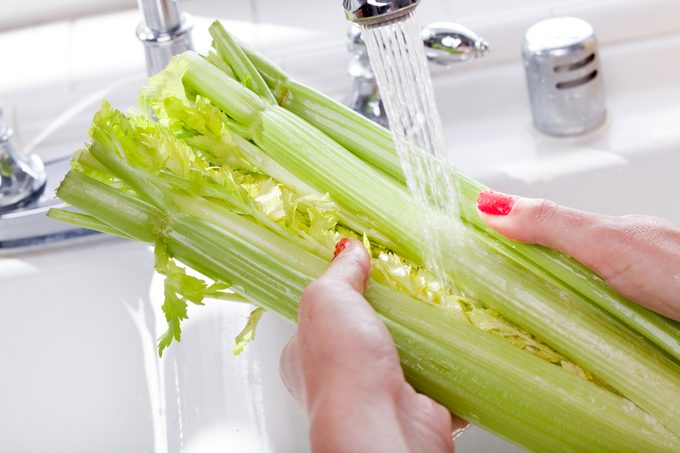 Woman Washing Celery