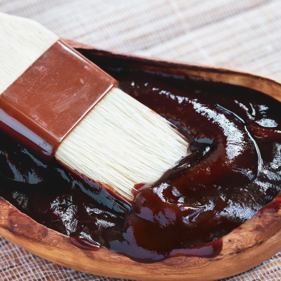 BBQ Brush a Wooden Bowl Filled with Sauce