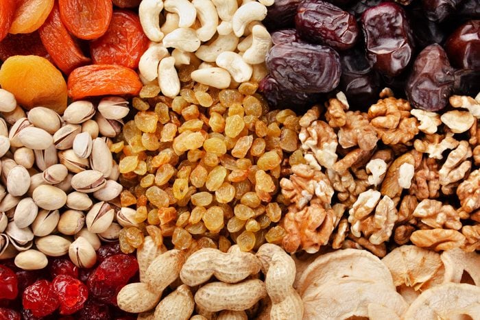 Flat Lay View At Assorted Dried Fruits And Nuts. Healthy Vegetarian Food Concept