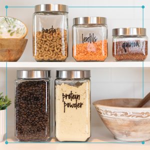 an organized kitchen shelf with labeled glass jars with food
