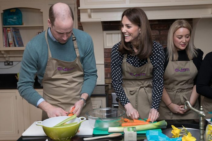 Prince William, Duke of Cambridge and Catherine, Duchess of Cambridge prepare soup as they visit Savannah House