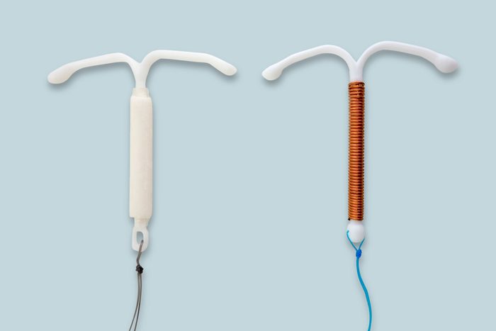 Hormonal And Copper Iud on blue background