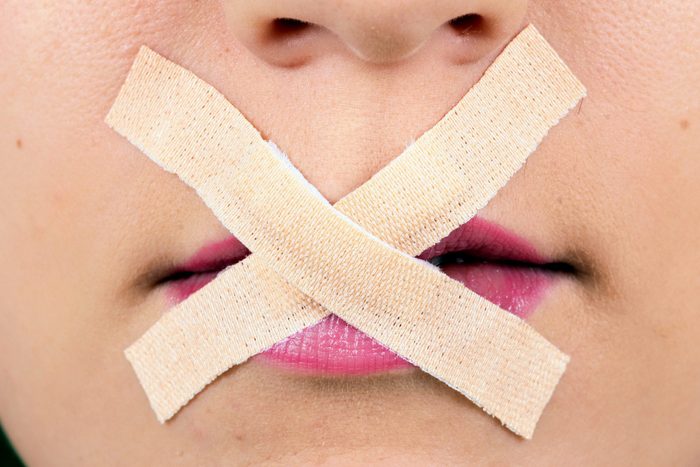 Censored Female Mouth with tape over the lips