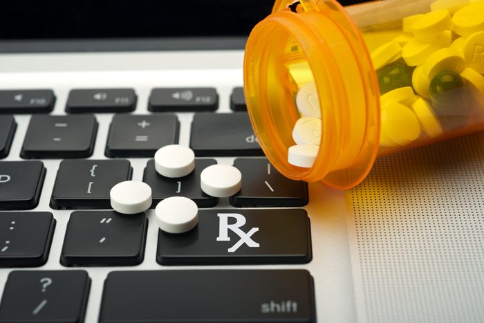 Prescription Medicine Bottle on Keyboard