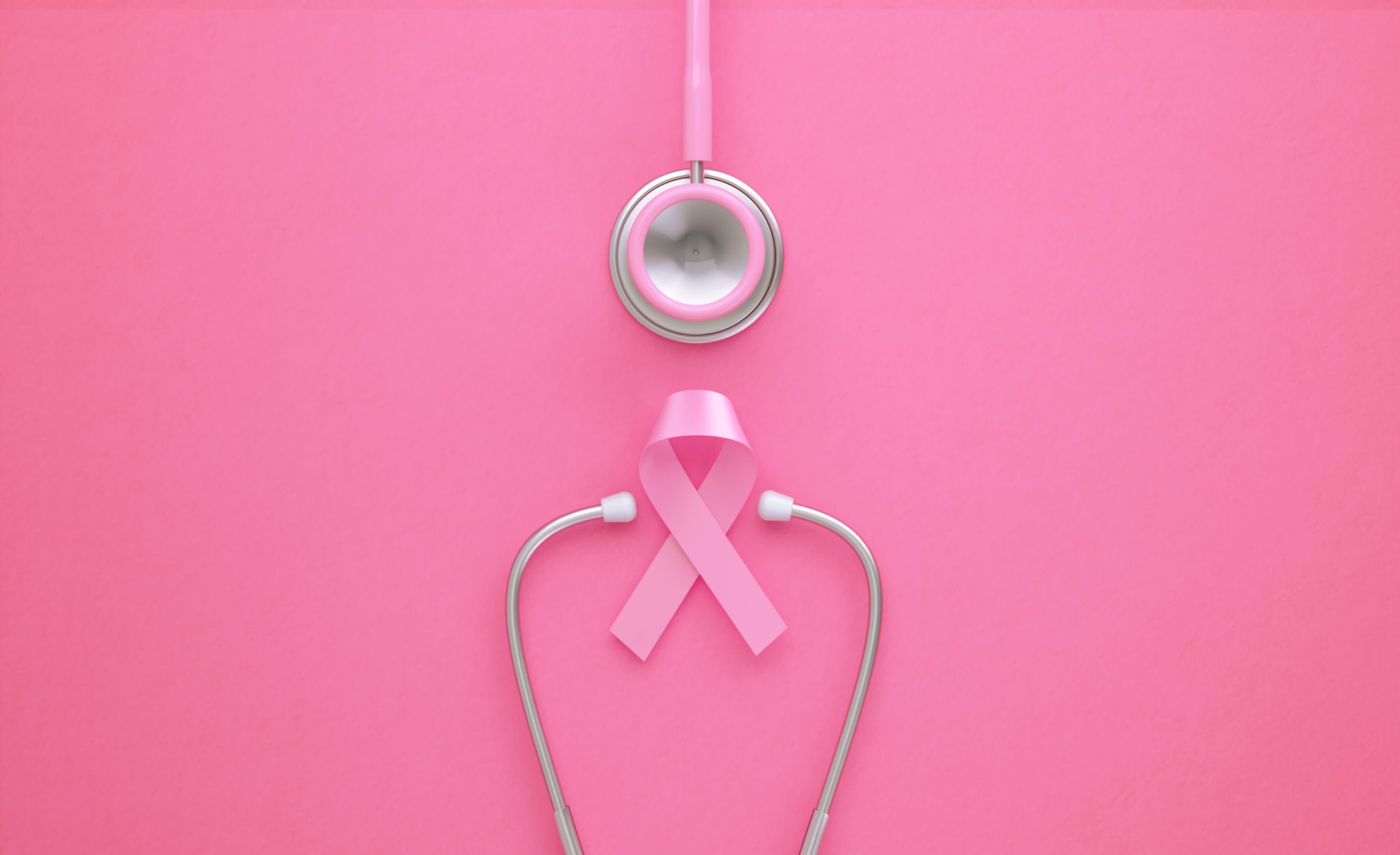 Pink Stethoscope and Pink Breast Cancer Awareness Ribbon on Pink Background