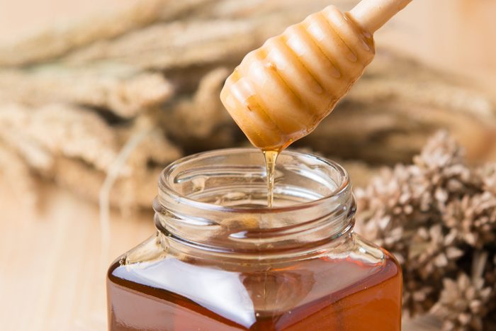honeycomb, honey on wooden background