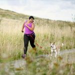 Is It Safe for Your Dog to Run (or Bike) With You? Here’s the Farthest Experts Say You Should Go