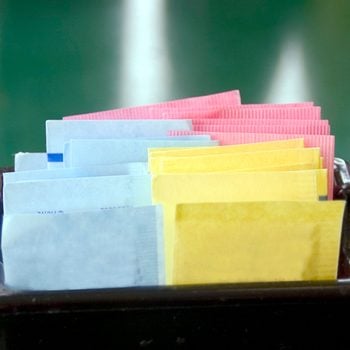 Artificial Sweetener Caddy filled with assorted colorful artificial sweeteners