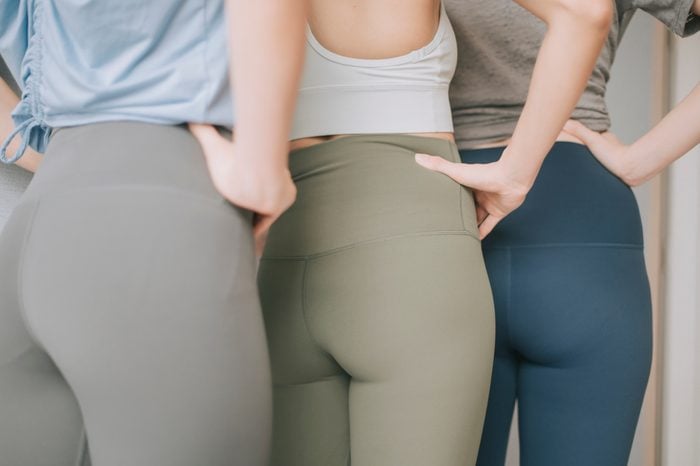 rear view mid section of asian chinese woman with yoga pants sport clothing sexual sporty sportive tempting beautiful attractive nice round tight pants leggings