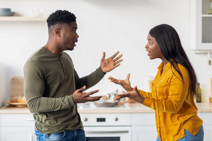 Domestic Conflicts. Young Black Spouses Arguing In Kitchen, Suffering Relationship Problems