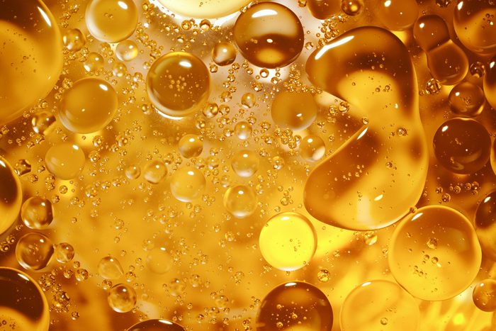 close up detail of olive oil bubbles