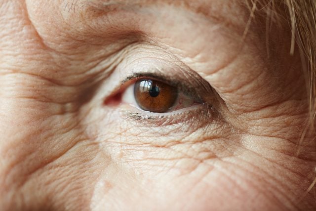 Female eye of elderly woman