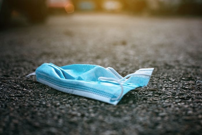 Used Surgical Mask Lying On The Street