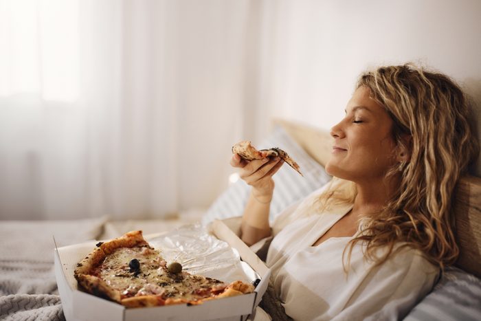 Oh how I enjoy eating pizza in a bed!