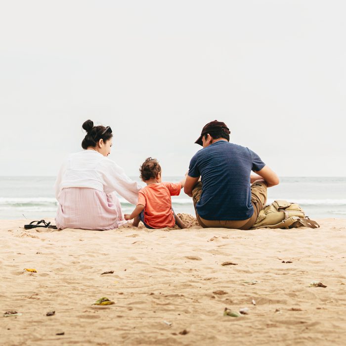 Family of three On The Beach