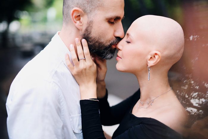A man supports his beloved woman who is fighting breast cancer, Valentine's Day, International Breast Cancer Day