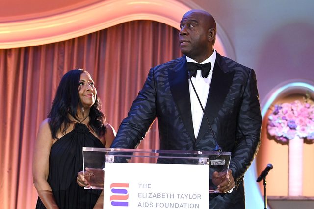 Cookie Johnson and Magic Johnson speak onstage during the Elizabeth Taylor Ball To End Aids, September 2023