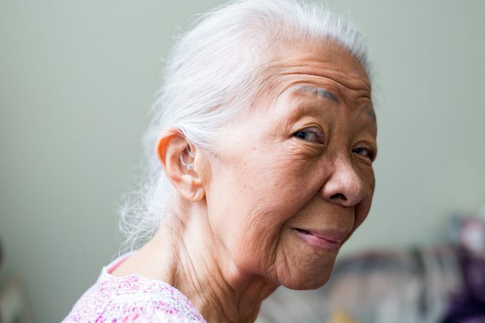 senior woman wearing hearing aids