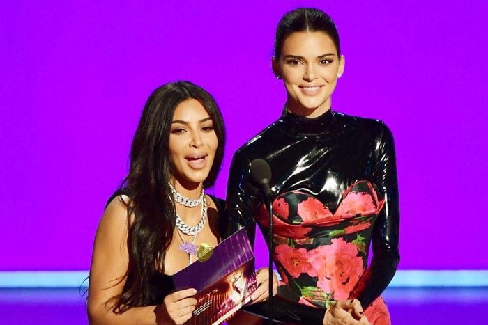 Kim Kardashian (L) and Kendall Jenner present the award for Outstanding Competition Program onstage during the 71st Emmy Awards at the Microsoft Theatre in Los Angeles