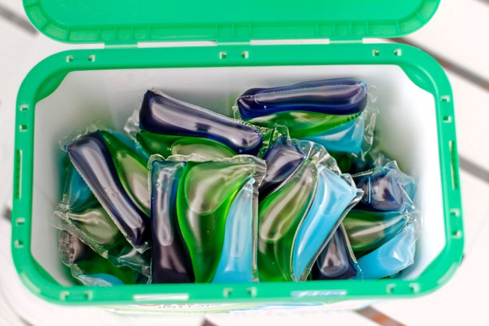 Close Up Of Open container of laundry detergent pods